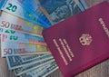 German passport and foreign currencies- travel money Royalty Free Stock Photo